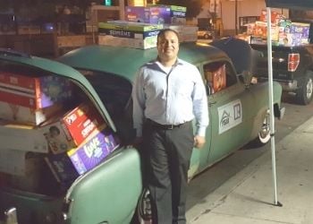 Rafael has loaded his 1951 Chevy for diaper drive